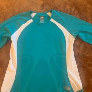 Women’s North face running top Size M